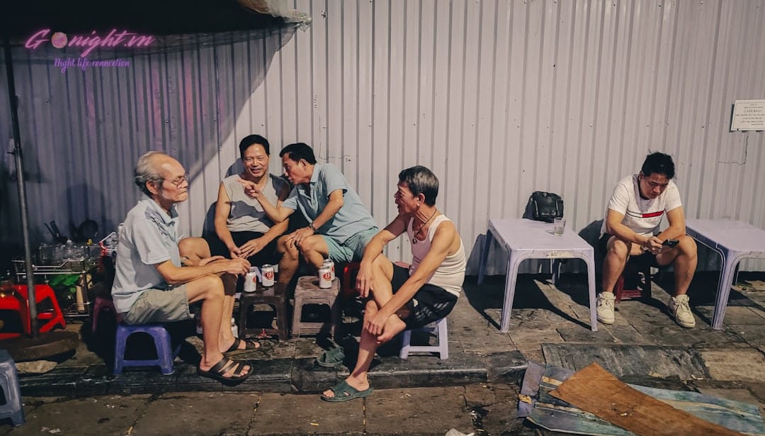 energetic pub in vietnam with young people dancing