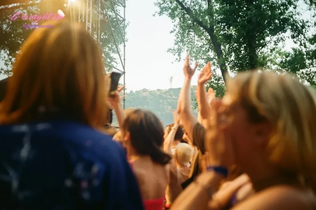 people standing near green trees during daytime
