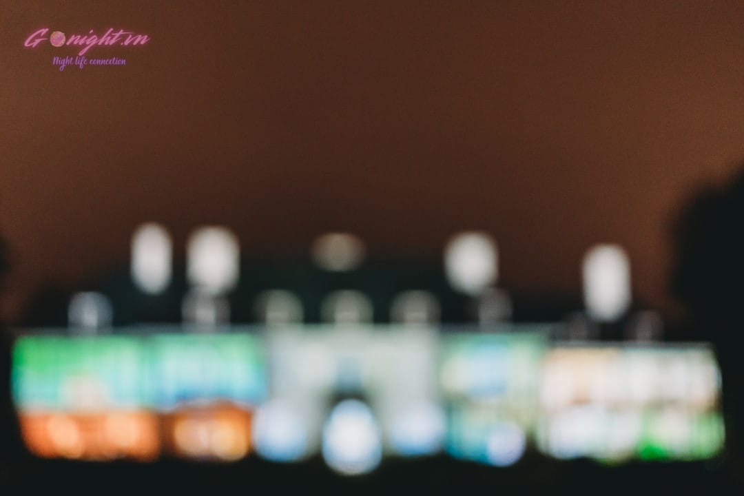 microphone on stage with bokeh lights