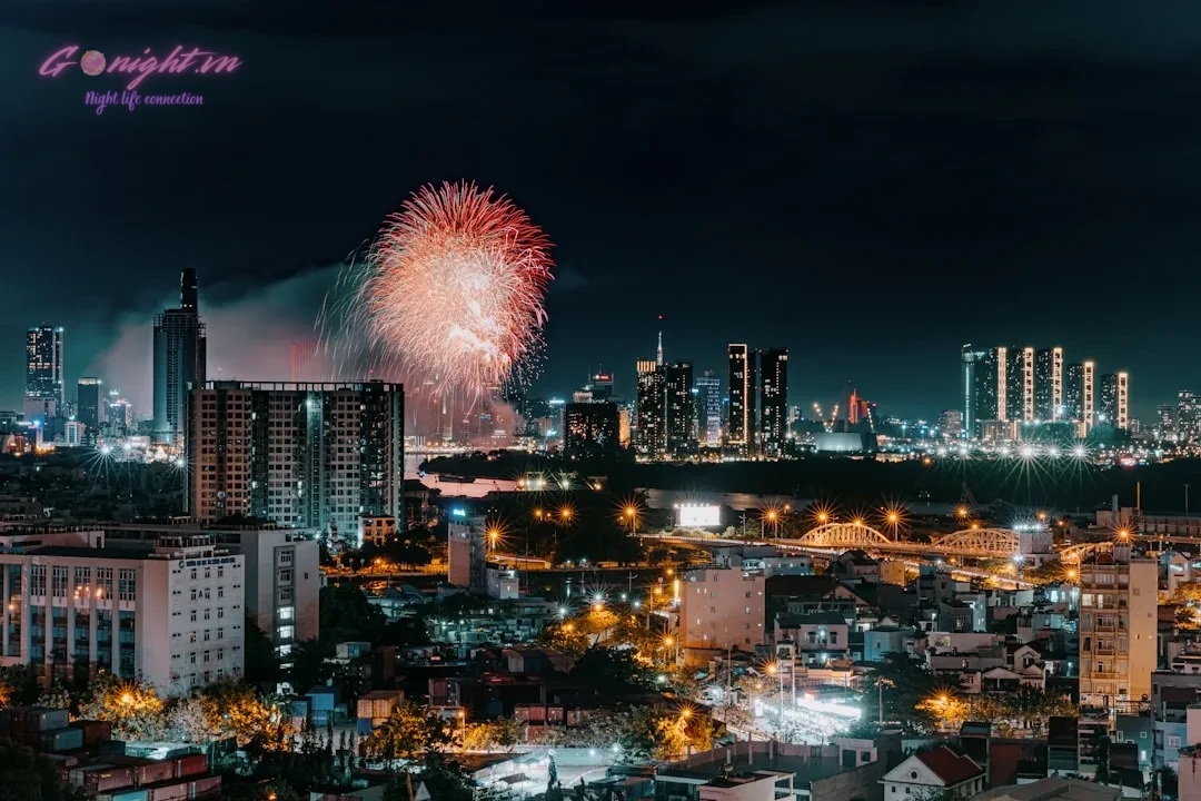 Soaring High: The Top Rooftop Bars in Ho Chi Minh City 2 fireworks over a city