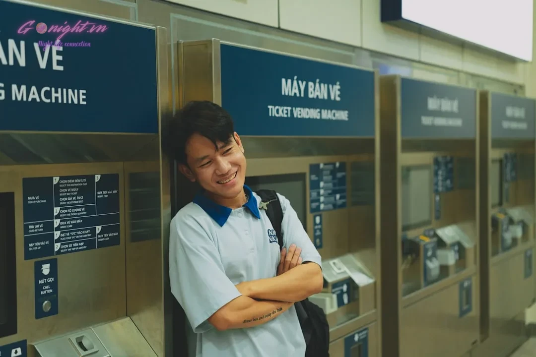 Essential Tips for First-Time International Travelers to Vietnam 2 A man is standing in front of a machine