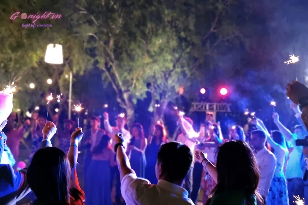Da Nang's Electrifying Nights: Top 7 Clubs for Unforgettable Parties 1 people holding lit sparklers