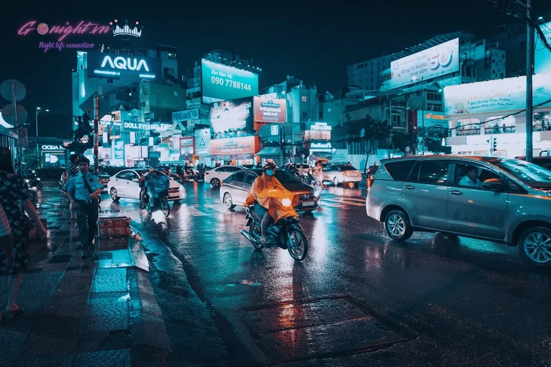 Chill Skybar & Dining: Is This Saigon's Premier Rooftop Destination? 1 person riding on motorcycle on road at night