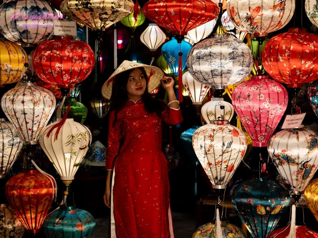 Hanoi After Dark: A Foreigner's Guide to the Best Karaoke Bars in Cầu Giấy District 10 Woman in red dress surrounded by colorful lanterns