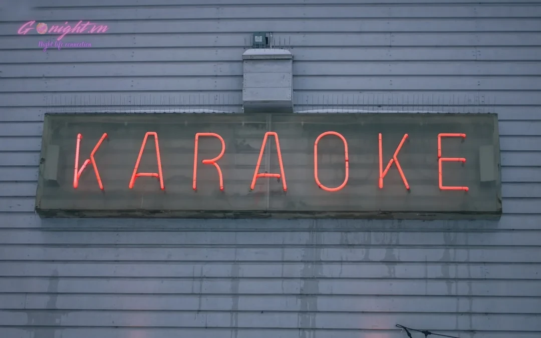 a neon sign on the side of a building