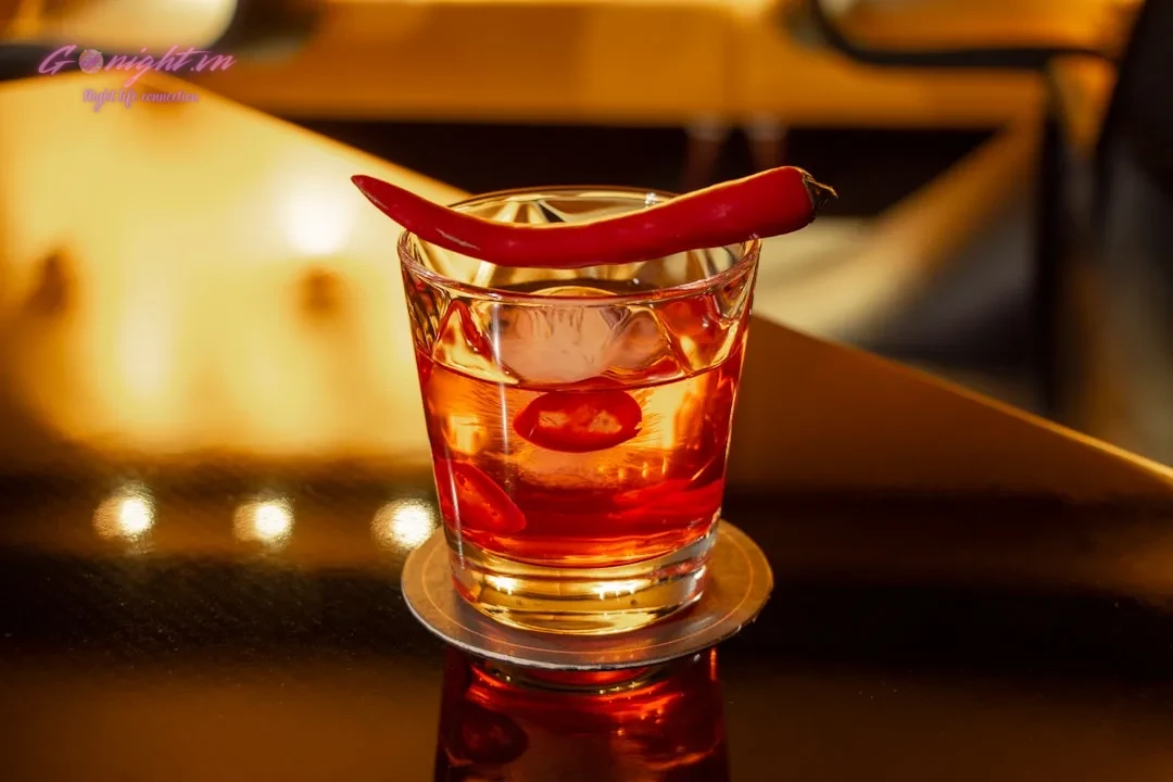 clear drinking glass with red liquid