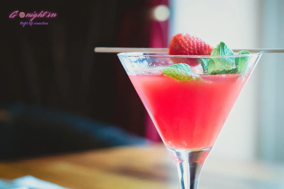 Unlocking Vietnam's Hidden Gems: A Guide to Finding and Enjoying Speakeasy Bars 2 selective focus photography of filled martini glass