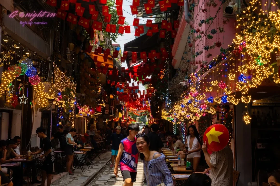 Top 7 Karaoke Hotspots in Cau Giay, Hanoi: Your Ultimate Guide to Singing in Style 1 A street decorated with festive lights and lanterns