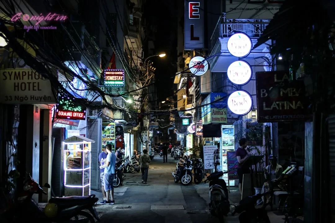 assorted-color concrete stores at night