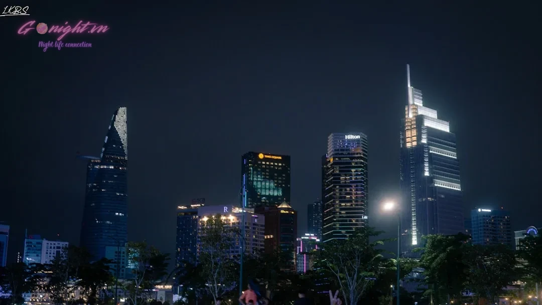 Beyond Bui Vien: Top 7 Craft Cocktail Bars in Ho Chi Minh City's District 1 for a Sophisticated Night Out 1 A city at night with a lot of tall buildings