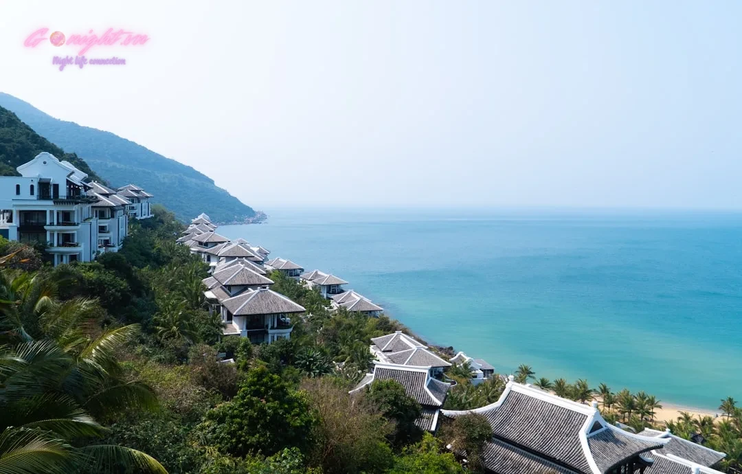 Sunset Sessions: 7 Best Rooftop Bars in Da Nang for Breathtaking Ocean Views 5 white and brown house near body of water during daytime