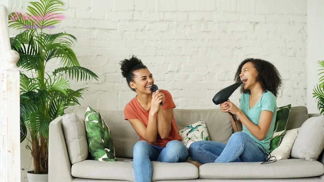 Hát Hay Không Bằng Hay Hát: Khám Phá Top 7 Quán Karaoke 'Đỉnh Của Chóp' tại KDC Trung Sơn, Bình Chánh 5 Two women singing into a microphone and hairdryer