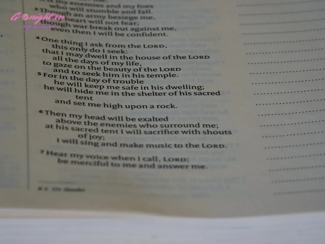 a close up of a book with a poem on it