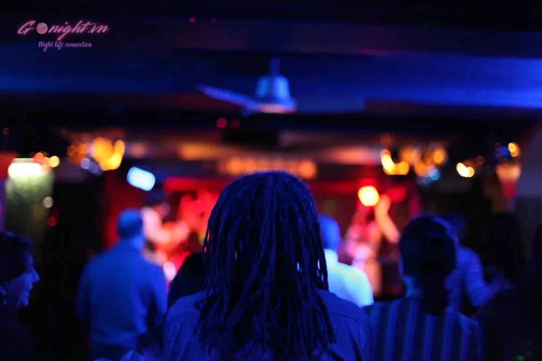 people in a bar with lights