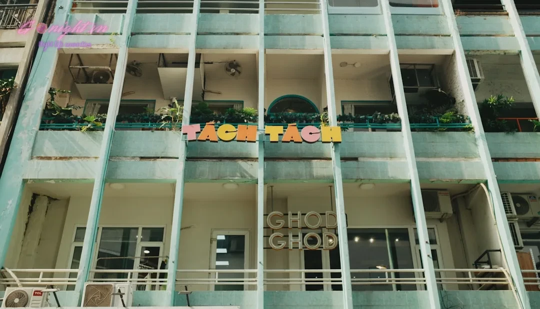 Top 5 Relaxation Havens: Best Massage Spas in Ho Chi Minh City's District 10 1 Building facade with colorful signage and balconies.