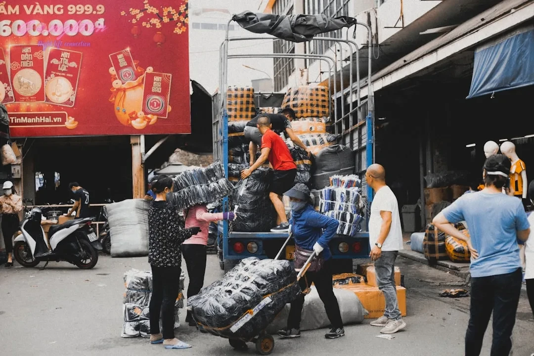 Beyond The Music: A Comprehensive Guide to Vietnamese Karaoke Etiquette and Experience 9 a group of people standing around a pile of luggage