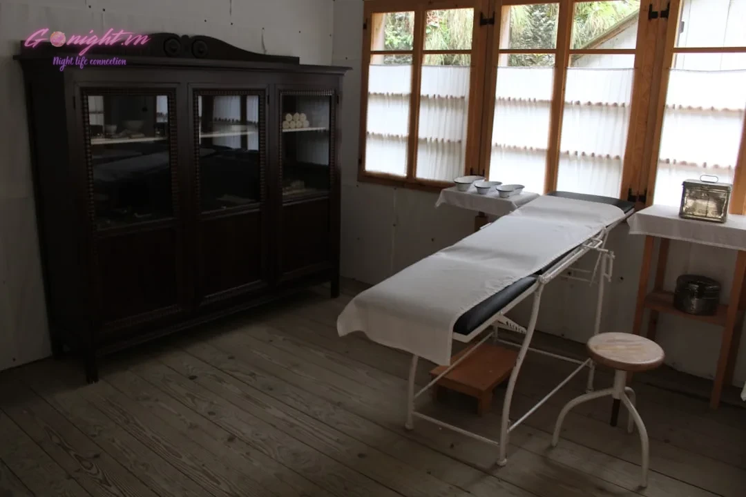 Top Địa Chỉ Massage Nam Bình Dương Thư Giãn Đỉnh Cao Cho Phái Mạnh 6 an ironing board in a room with wooden floors