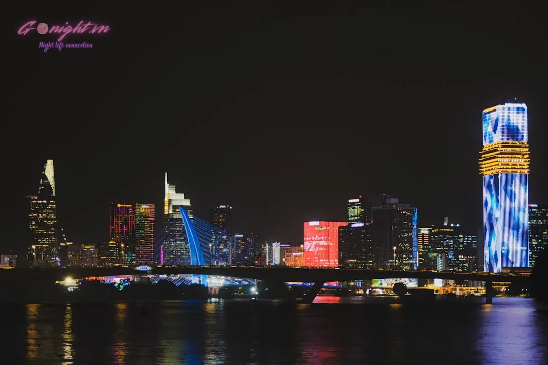 Mastering Saigon's Nightlife: Your Guide to Planning the Perfect Evening (From Cocktails to Late-Night Vibes) 1 Vibrant cityscape with illuminated buildings at night