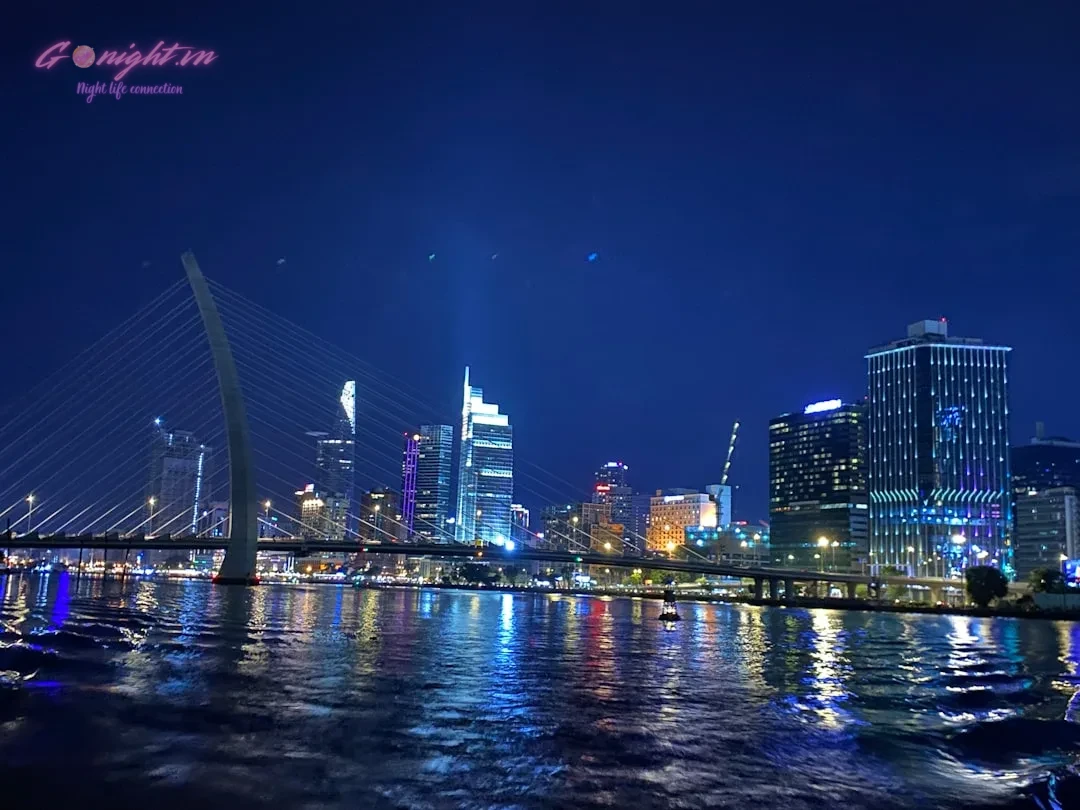 A beautiful cityscape is lit up at night.