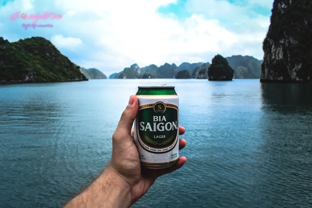 Mastering Saigon's Nightlife: Your Guide to Planning the Perfect Evening (From Cocktails to Late-Night Vibes) 4 person holding Bia Saigon can