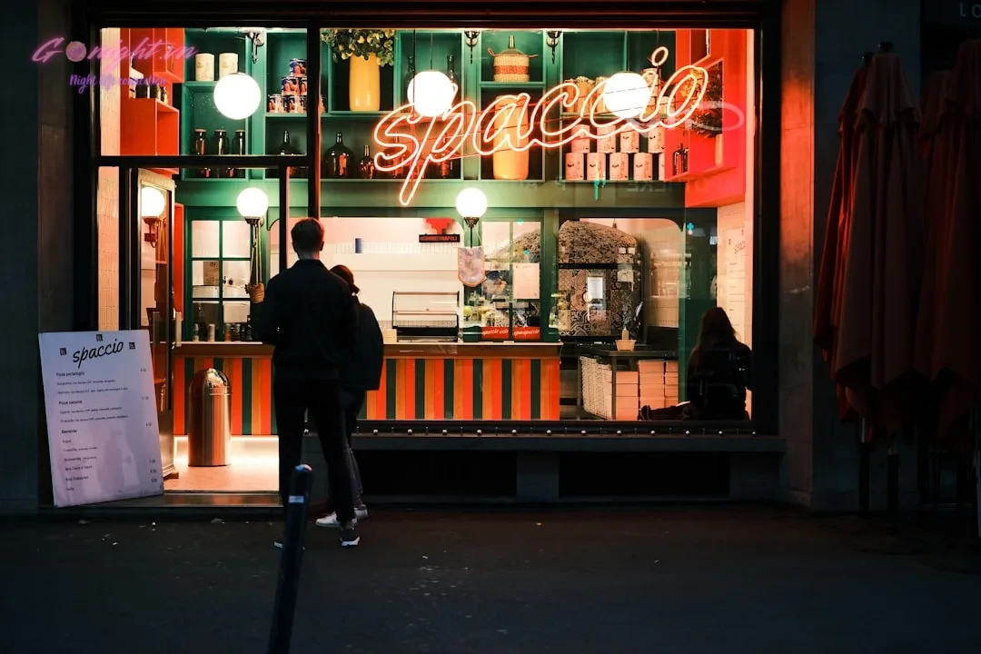 a person walking in front of a storefront