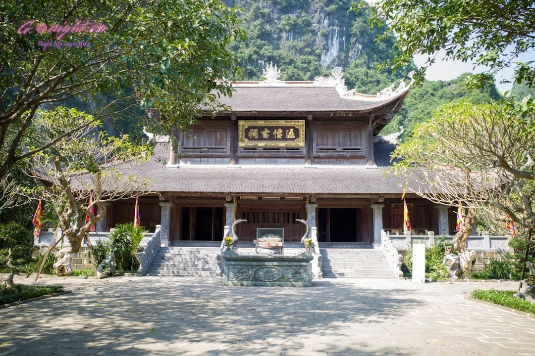 A beautiful temple nestled at the mountain's base.