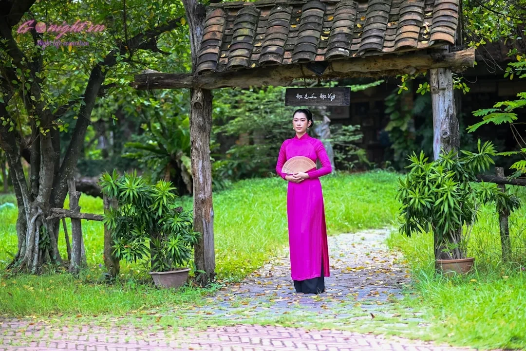 Top Spa Massage Bình Dương Uy Tín Nhất Cho Bạn Thư Giãn 7 a woman in a purple dress standing in front of a gazebo